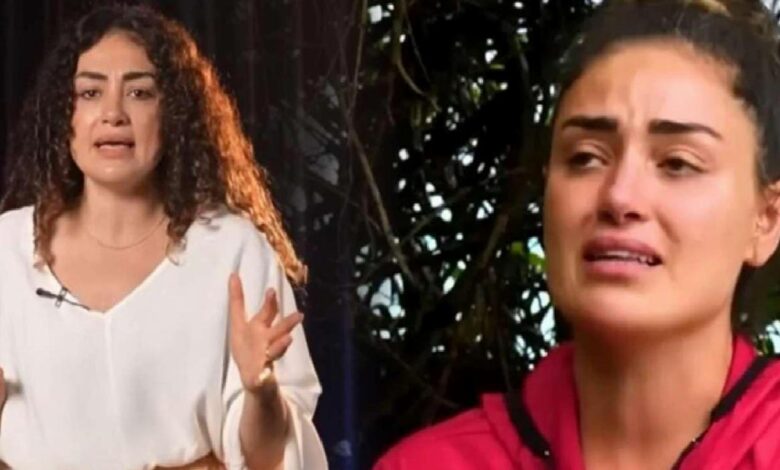 Two women in a tense moment: the left figure speaks with hand gestures, while the right figure looks distressed and tearful.