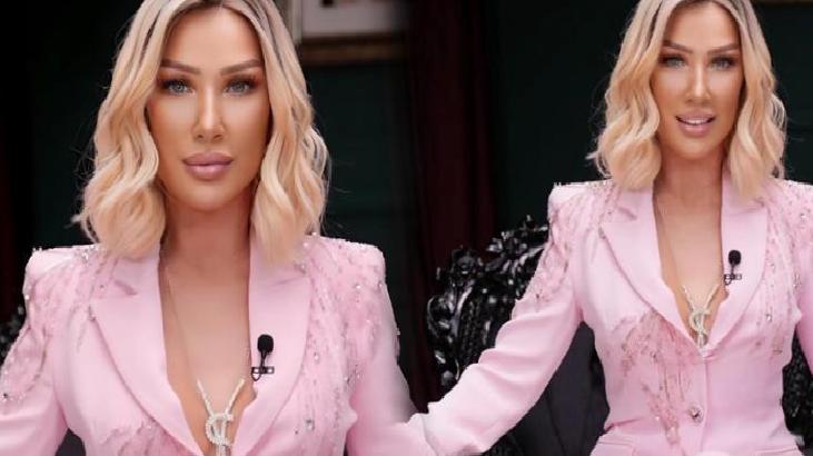 Two images of a blonde woman in a pink blazer with a lapel microphone, posing in a studio setting with dark background.