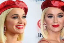 Two women with platinum blonde bob hair, wearing red berets and bold red lipstick, smiling at a backdrop.