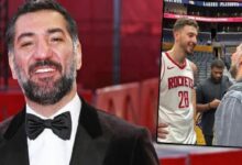 Man in a black tuxedo and bow tie smiles on a red carpet; an inset shows a Rockets player wearing jersey 28 talking to a man in a gray jacket on a court backdrop.