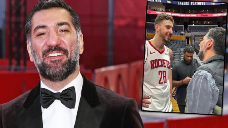 Man in a black tuxedo and bow tie smiles on a red carpet; an inset shows a Rockets player wearing jersey 28 talking to a man in a gray jacket on a court backdrop.
